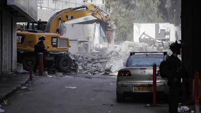 İsrail Kudüs´te Filistinlilere ait 14 dükkanı yıktı